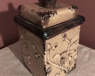Rustic ceramic container with lid-bird perched on top