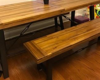 Wooden picnic style dining table.