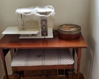 Sewing machine sold. Table and bench available 