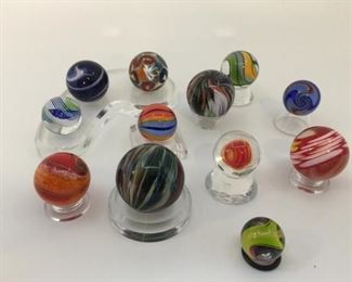 Assortment of 12 Artisan Blown-Glass Marbles https://ctbids.com/#!/description/share/258888