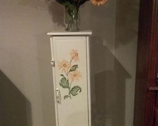 Hand Painted Storage Cabinet and Floral Arrangement