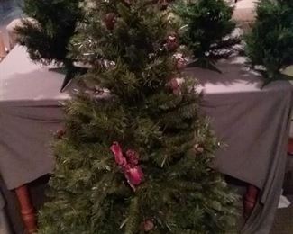 Four Artificial Christmas Trees