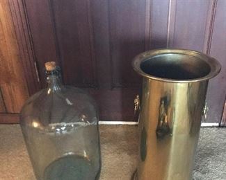Brass umbrella stand and large vintage water bottle