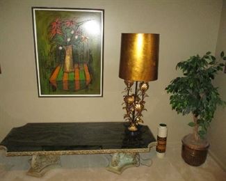 Coffee table, table lamp and artwork