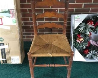 #50 ladder back chair with rope seat "as is"  $ 25.00