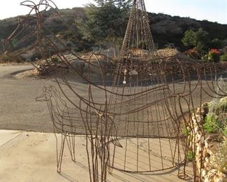 Large and small wire metal horse sculpture and christmas tree