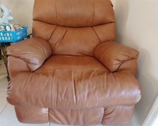 Recliner.  Has some wear spots on the seat and corners