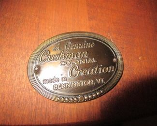 Cushman Medallion Attached to Each Piece of Furniture