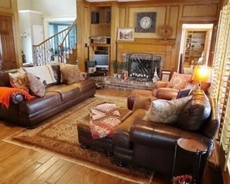 Leather Pottery Barn sofa, chairs and ottomans.