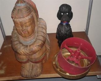 the cast iron poodle looks shocked at how much is here!