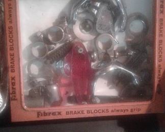 Tin and glass store display with parts