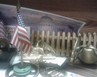 Vintage putz fence and lots of old bells, brass, cast iron collectibles throughout