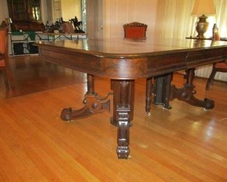 Walnut Dining Table, Eastlake style, split pedestal when open, 50"W - 50"L closed or 70"L open, Late 19th Century