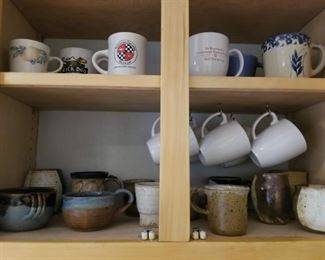 Big assortment of hand made pottery coffee cups mugs