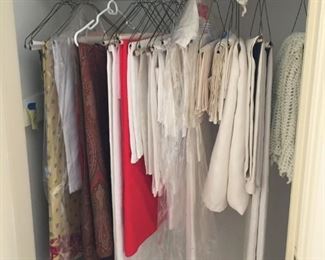 beautifully ironed cloths and decoratives, as well as throws, etc.