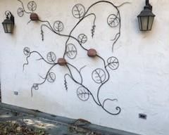 amazing sculpture - with planting pots.  could be on your outside wall.  Large