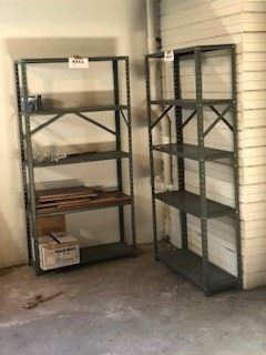two racks join the ladder and other utilitarian things in the basement.