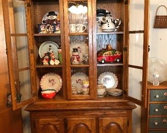 Excellent condition china display filled with Christmas items