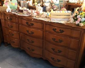 Pristine triple dresser covered in Easter decor