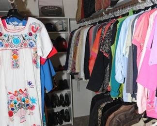 various designer men's women's brands in various sizes including furs, a vintage St Laurent Rive Gauche, Cold Water Creek, Chicos, DKNY and Levi's. Throw pillows. Men's and women's shoes in various sizes and in mostly new condition