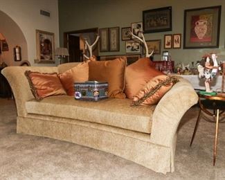 Designer golden plush sling back couch. Designer futuristic mirrored end tables. Antler candelabras. Hand painted circa 1950s small travel case