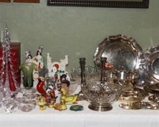 Stuben and Tiffany glass. Various large Sterling pieces. Asian / middle Eastern decor. Large correction of new Simon Pearce glass. Waterford Crystal Christmas glasses