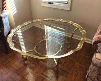 keevan sadock pie crust, brass and cocktail table 42" diameter, as seen on The Marvelous Mrs. Maisel Season 3 Episode 2 in the living room