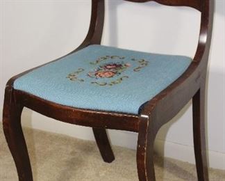 Mahogany Duncan Phyfe Style carved back side chair with needlepoint seat.