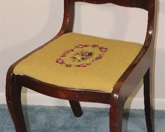 Mahogany Duncan Phyfe Style  carved back side chair with needlepoint seat.