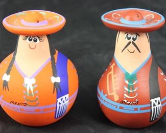 Terra-cotta hand painted salt and pepper shakers made in Mexico