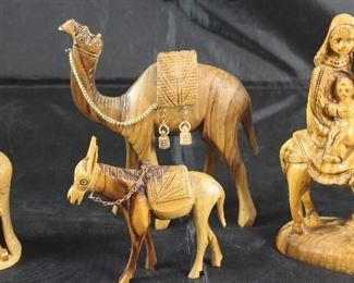 Wood carved 3 piece Holy Family with Camel and Donkey Shown with Ball Manger Scene Ornamnet