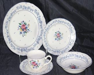 “Flower Garden” by Nikko Homestead Collection for table mates.  9 dinner plates, 9 B&B plates, 10 coupe cereal bowls and 9 cups and saucers