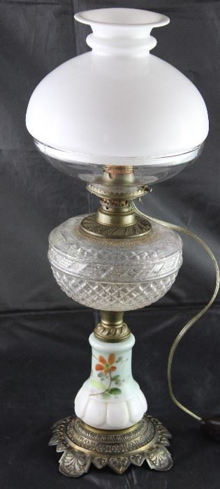 Antique oil lamp with hand painted base patterned glass font milk glass globe on clear glass vase with electrical added