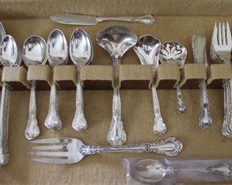 “Chantilly” by Gorham Sterling Silver Flatware c.1950: 8 Dinner knives, 1 French Knife, 8 Dinner Forks, 10 Salad Forks, 19 teaspoons, 8 Iced Tea Spoons, 6 individual butter knives, 2 Round soup spoons, 3 Table serving spoons, 1 meat fork, 1 gravy Ladle, 1 sugar Spoon and 1 Master butter knife 