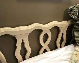 King bed with white wood headboard 