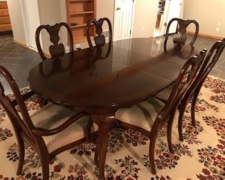 Pilgrim House, Mahogany dining table with 6 chairs, an extra leaf and table pads