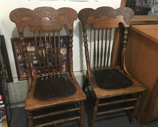 Pair of vintage leather seat chairs