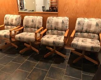 Set of 4 upholstered dining roller chairs by Douglas Furniture Company