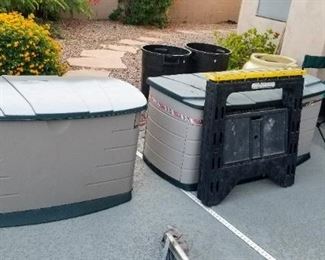 2 more outside storage containers & 2 plastic saw horses