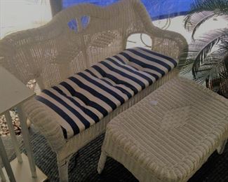 White wicker settee and table
