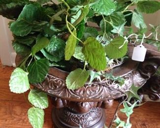 One of two matching planters and greenery