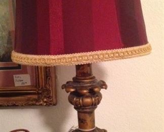 One of two red-shade lamps