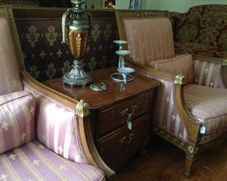 Matching chairs with brass accents