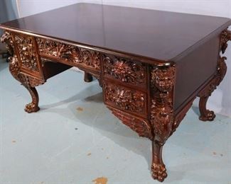 060b  Mahogany heavily carved partners desk with wing griffins, attrib. to Horner, 31 in. T, 56 in. W, 34 in. D.