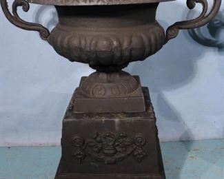 240c  Pair of cast iron planters on stand, 28 in. T. 27 in. Dia.