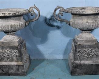 324a  Pair of cast iron urns with double handles and base, 30 in. T, 29 in. W.