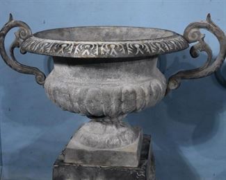324c  Pair of cast iron urns with double handles and base, 30 in. T, 29 in. W.