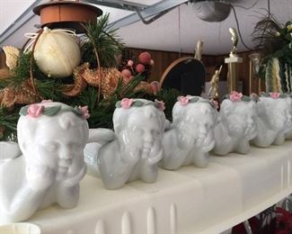 Christmas floral arrangement and cherubs