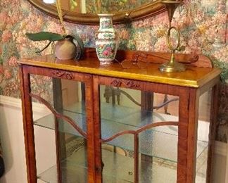 Small curio cabinet, gilded mirror