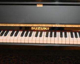 Beautiful Black Lacquer Suzuki Upright Piano with Brass Details (it comes with a piano bench, not shown)